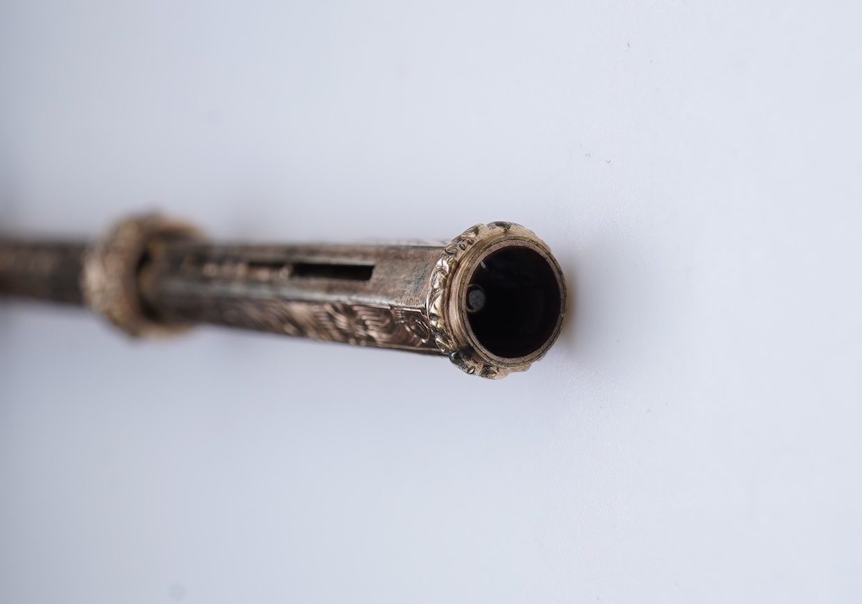 An early Victorian gold and amethyst mechanical pencil, mid 19th century